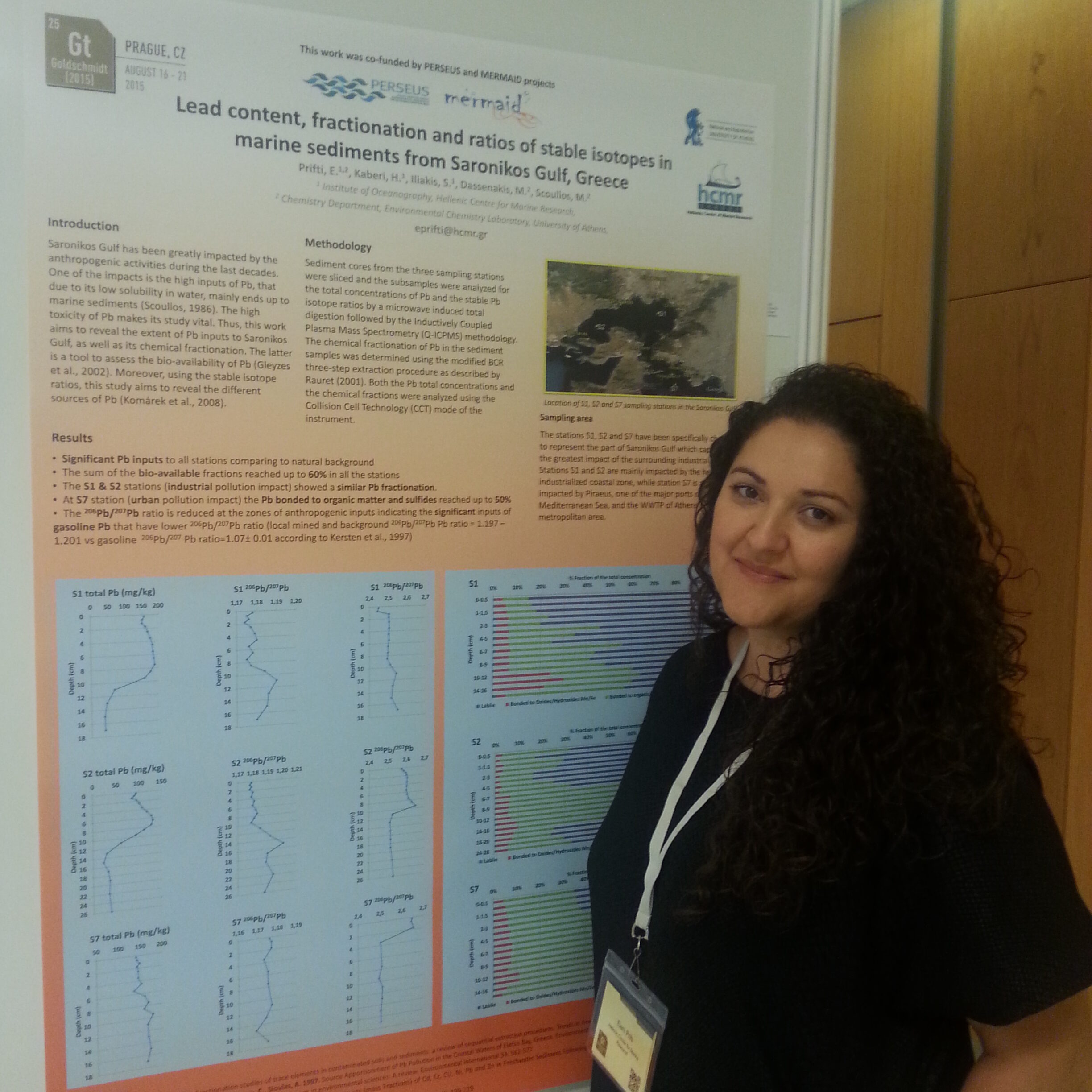 Eleni Prifti in front of a scientific poster